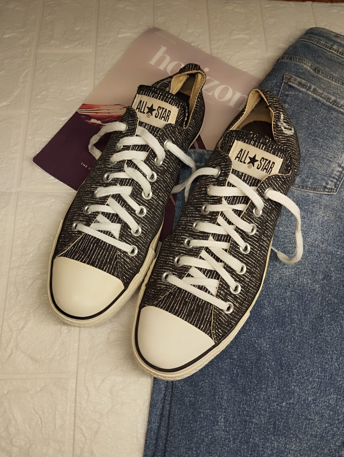 Black textured low rise converse